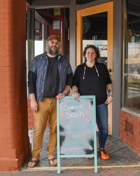 Amos and Shelby Hale outside 9 Lives Tavern